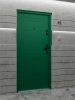 Ekonomiczne drzwi wewnątrzklatkowe wejściowe do mieszkania z klatki schodowej 55 mm stalowe zielone T34